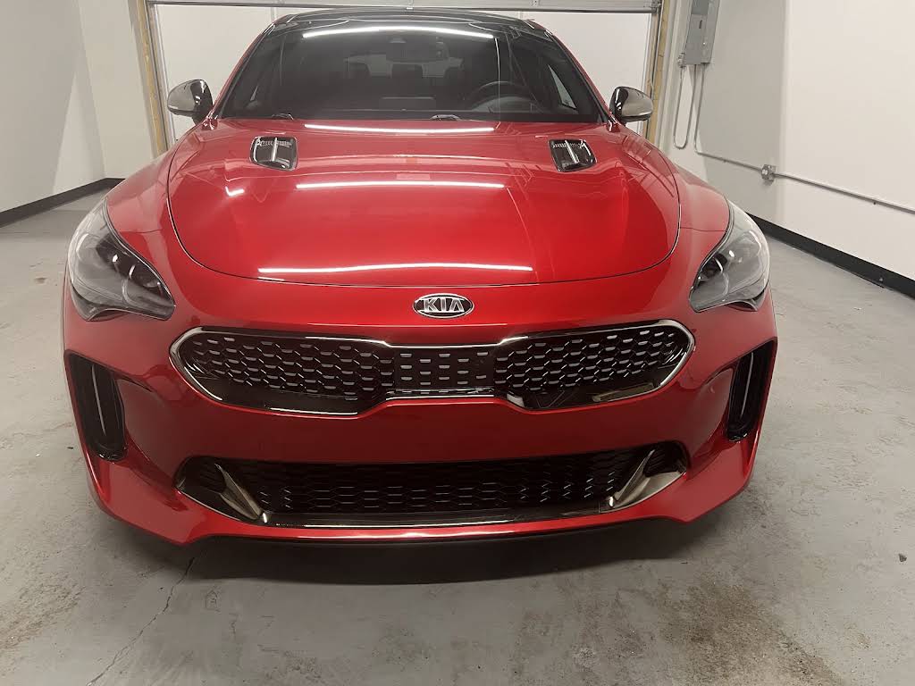 Red Kia photographed by Detail Doctor in the detailing shop
